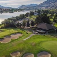 photo of riverside golf course with water inlet on bottom left
