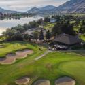 photo of riverside golf course with water inlet on bottom left